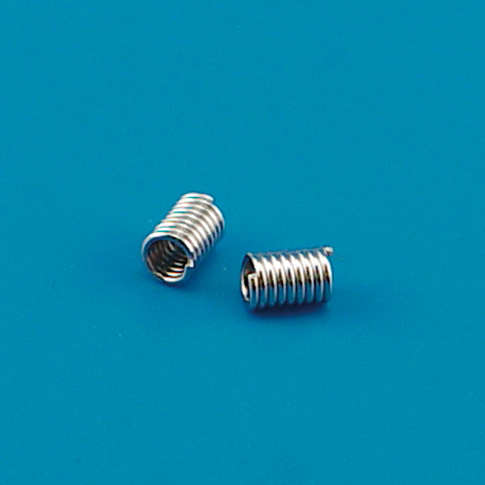 Darice • Abstandhalter spulenförmig Silber 18pcs 5x8mm